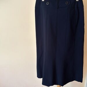 I.E. navy blue skirt.
